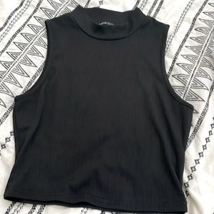 This is a black tank top from SHEIN!:) It is a size M, and it is stretchy!:)